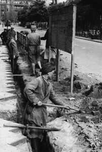 Women dig to lay telephone cables. Berlin, 1947. Erich O. Krueger/German Federal Archives